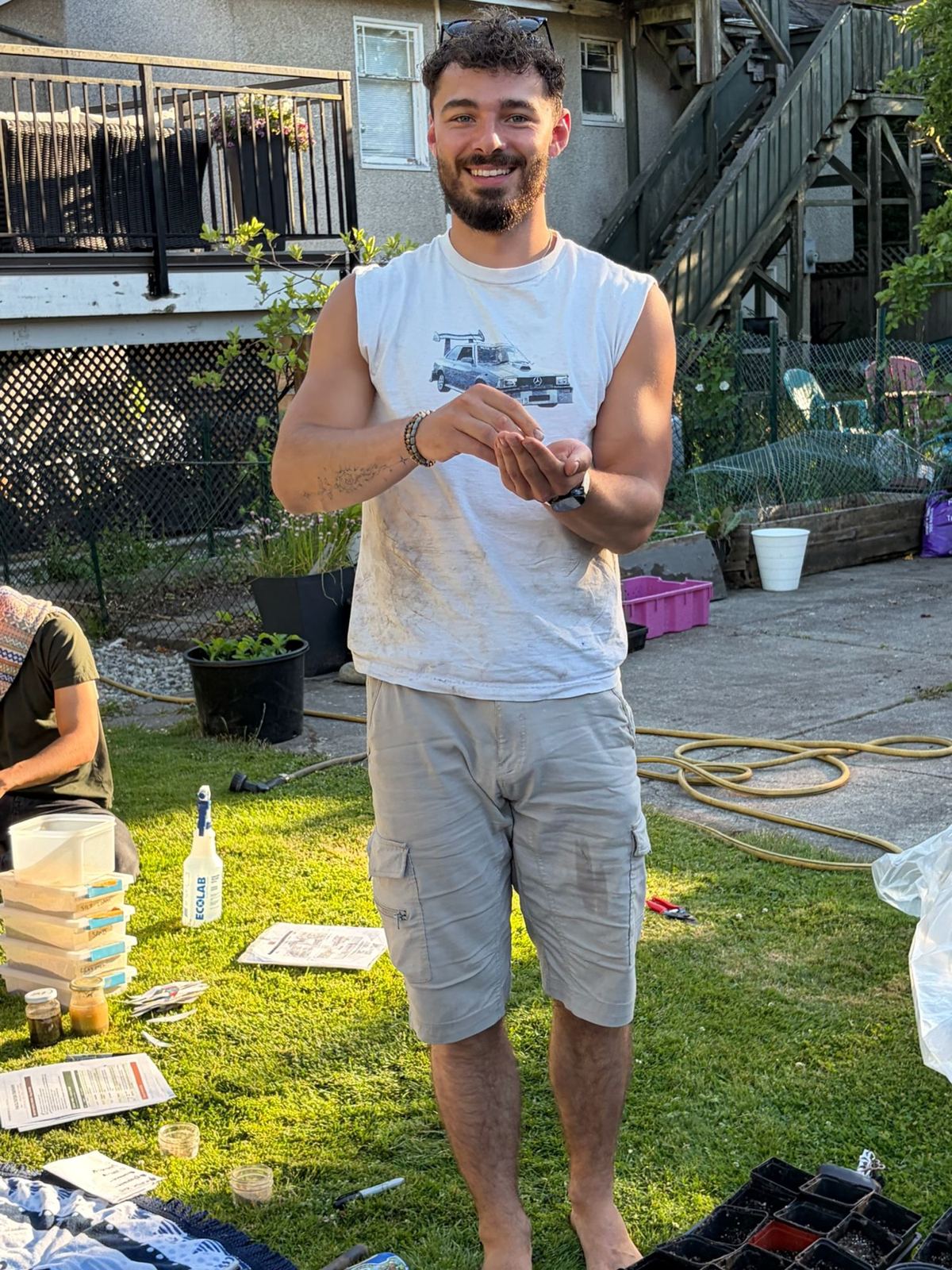 Nathan smiling during an outdoor workshop